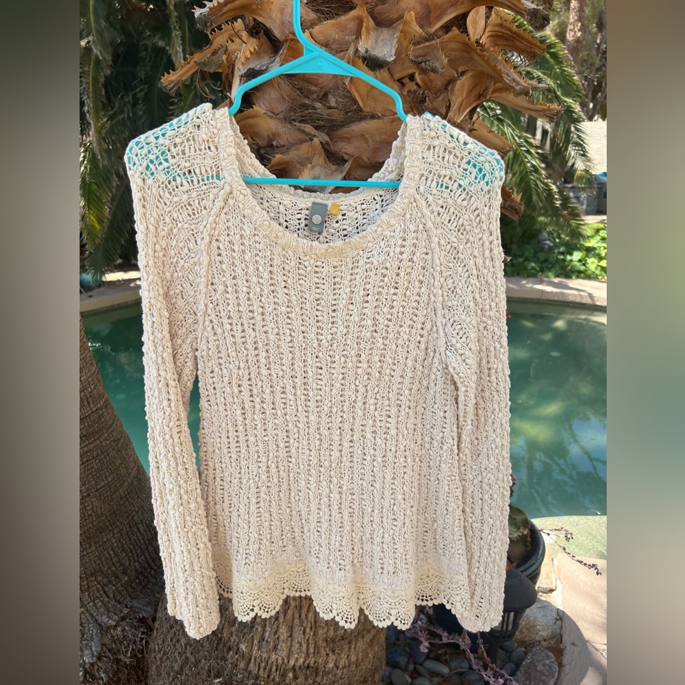 White and soft sweater.